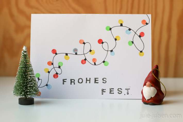 Weihnachtskarte mit einer gestempelten Lichterkette Weihnachtskarte mit einer gestempelten Lichterkette