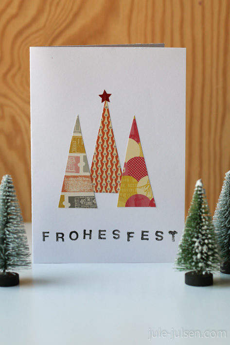 Weihnachtskarte mit drei Tannenbaeumen aus buntem Papier Weihnachtskarte mit drei Tannenbaeumen aus buntem Papier